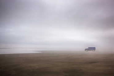 Truck on foggy beach, Long Beach, Washington, USA