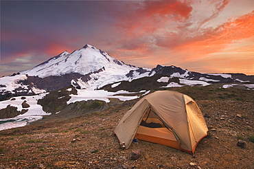 Tent at campsite in snowy mountain landscape