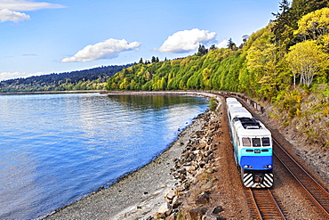 Commuter train on tracks at waterfront