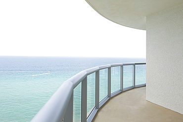 Empty balcony overlooking ocean, Miami, Florida, USA