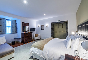 Bed and vanity in hotel room, Peso da Regua, Vila Real, Portugal