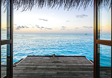 Wooden dock and ocean at sunset, Male, Maldives, Maldives