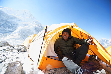 Man sitting in base camp tent, Everest, Khumbu glacier, Nepal, Everest, Khumbu glacier, Nepal