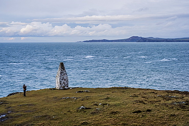 Cardigan Bay and stone cairn marking the entrance to Porthgain Harbour from the Pembrokeshire Coast Trail, Pembrokeshire National Park, Wales, UK, Pembrokeshire National Park, Wales