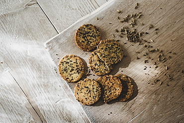 High angle close up of freshly baked seeded crackers, England