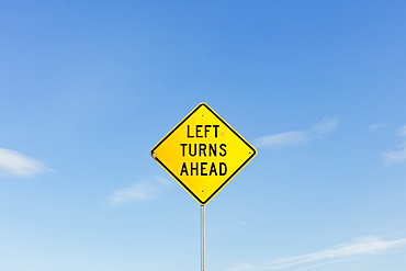 Left Turns Ahead yellow traffic sign, Whitman County, Washington, USA