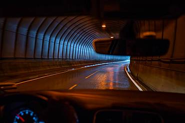 Driver's view, driving through a road tunnel, Lofoten Islands, Norway