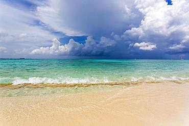 A beach on an island, and view over turquoise sea, Grand Cayman, Cayman Islands