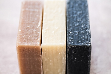 High angle close up of three bars of homemade bars of soap