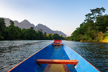 Nam Song River, a boat on the water at Vang Vieng, Laos, Laos