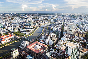 High angle view over river running through a city, Vietnam