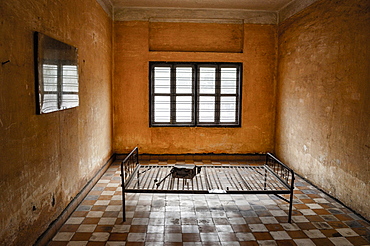 Interior view of prison cell at the Tuol Sleng Genocide Museum, Phnom Penh, Cambodia