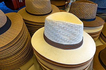 Panama style hats on sale in the Mercado Municipal, the main market in Tavira, Algarve, Portugal