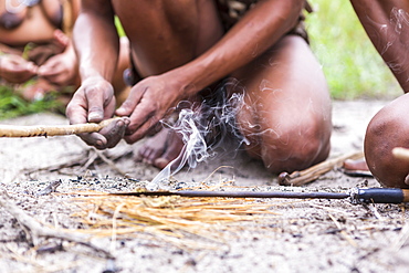 close up of Bushman creating fire, Botswana