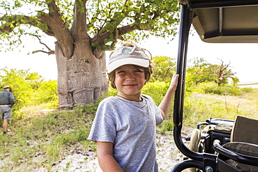 smiling Six year old boy, Baines Baobab, Botswana