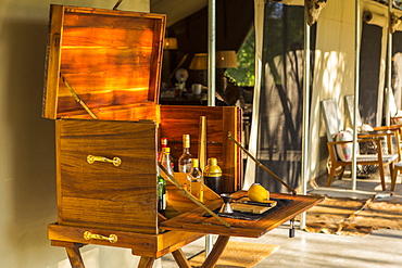 wooden liquor cabinet, at a safari camp, Maun, Botswana