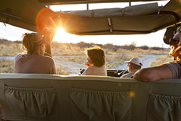 family in safari vehicle, Kalahari Desert, Makgadikgadi Salt Pans, Botswana