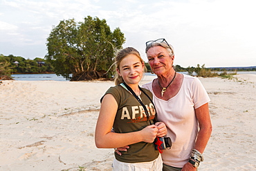 A senior woman and teenage girl, grandmother and her twelve year old grand daughter on vacation