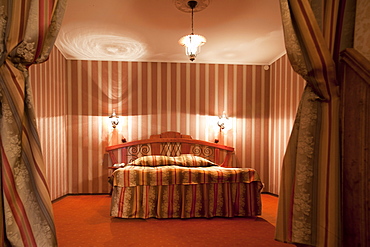 A hotel with old fashioned retro styled rooms, and rustic objects, Estonia