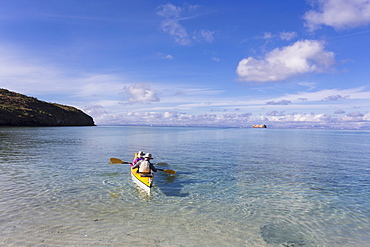 Couple in a kayak, paddling on the Sea of Cortes, also known as the Gulf of California, Mexico