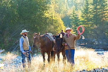 Cowboys and horses, British Colombia, Canada