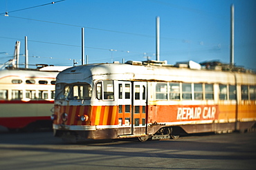 Repair vehicle and tram on rails