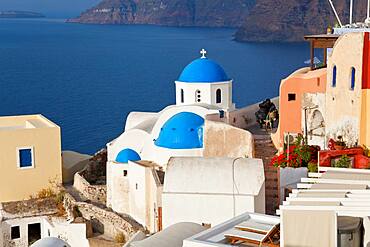 Loaded donkey in the village of Oia Santorini Cyclades islands, Greece