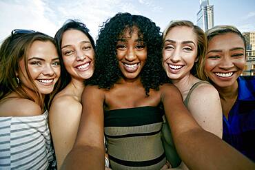 A group of five young women posing for a selfie