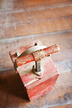 Dynamite Detonator, red box and a metal handle, a plunger to detonate dynamite in quarrying