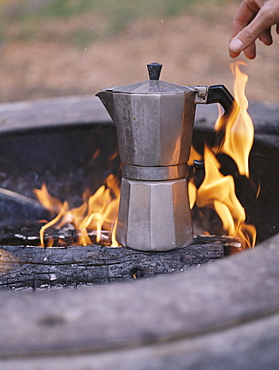 Espresso maker standing over an outdoor fire, Millcreek, Utah, United States of America