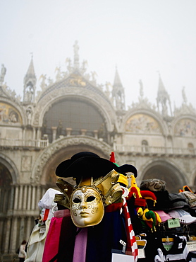 Piazza San Marco and the Basilica San Marco, A stall selling carnival masks and hats, Venice, Italy