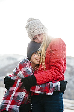 A brother and sister hugging each other, Mountains, Utah, USA