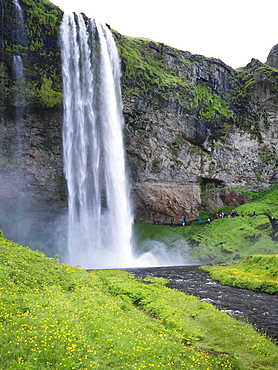 A waterfall cascade over a sheer cliff, Iceland