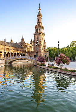 Plaza de Espana, a 20th century renaissance revival complex of buildings around a pool, with art deco aspects, Water and bridge, Seville, Andalusia, Spain