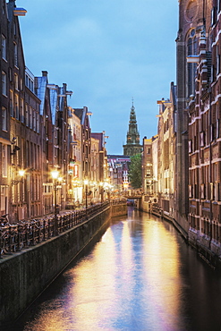 Lit Canal Between Buildings, Venice, Italy