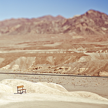 Empty Bench in Desert Landscape, Death Valley, California, United States of America