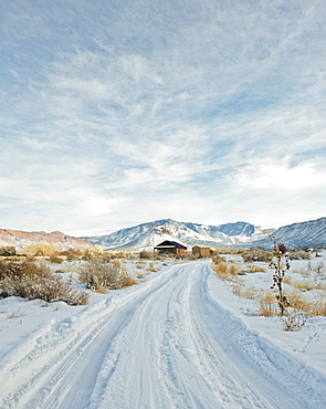 Snowy Trail Leading to a Remote House, Moab, Utah, United States of America