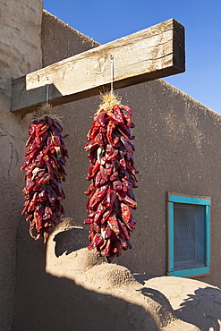 Red Chili Peppers Hanging Outdoors, Taos, New Mexico, United States of America