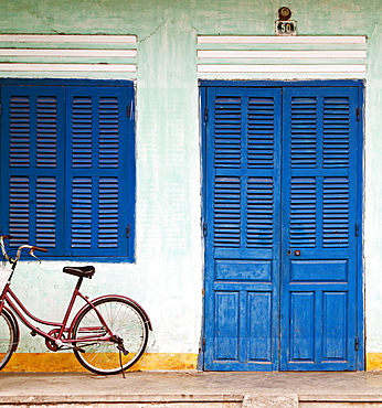 Bike Parked on a Front Porch, Hoi An, Vietnam