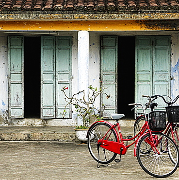 Bicycles parked outside old house, Hoi An, Vietnam