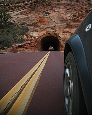 Car driving on rural road in Zion National Park, Utah, United States, Zion National Park, Utah, USA