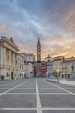 Clock tower, buildings and town square at sunrise, Piran, Coastal-Karst, Slovenia