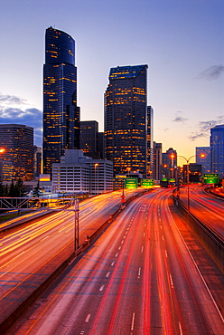 Long exposure view of traffic driving on urban highway, Seattle, Washington, United States