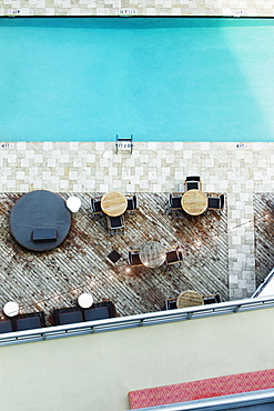 High angle view of tables at hotel swimming pool, Miami, Florida, USA