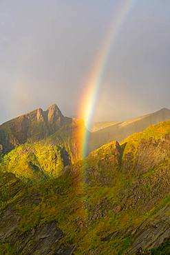 Rainbow in the mountains on Senja Island, Troms County, Senja Island, Lofoten Islands, Norway