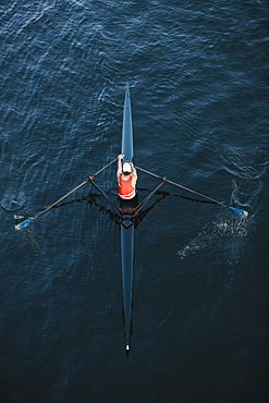 View from above of single scull crew racer, Lake Union, Seattle, Washington, United States of America