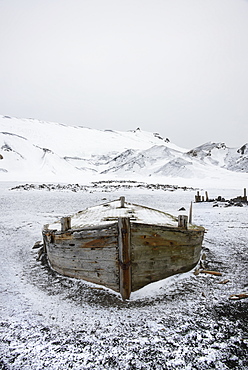 A wooden boat hull beached on Deception island, a former whaling station, Deception Island, South Shetland Islands, Antarctica