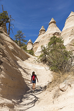 12 year old girl hiking in beautiful slot canyon Kasha Katuwe Tent Rocks, New Mexico