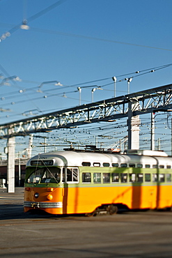 Tram with power lines above