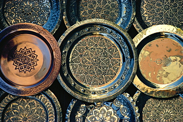 Close-up of copper trays for sale, Morocco, Africa 